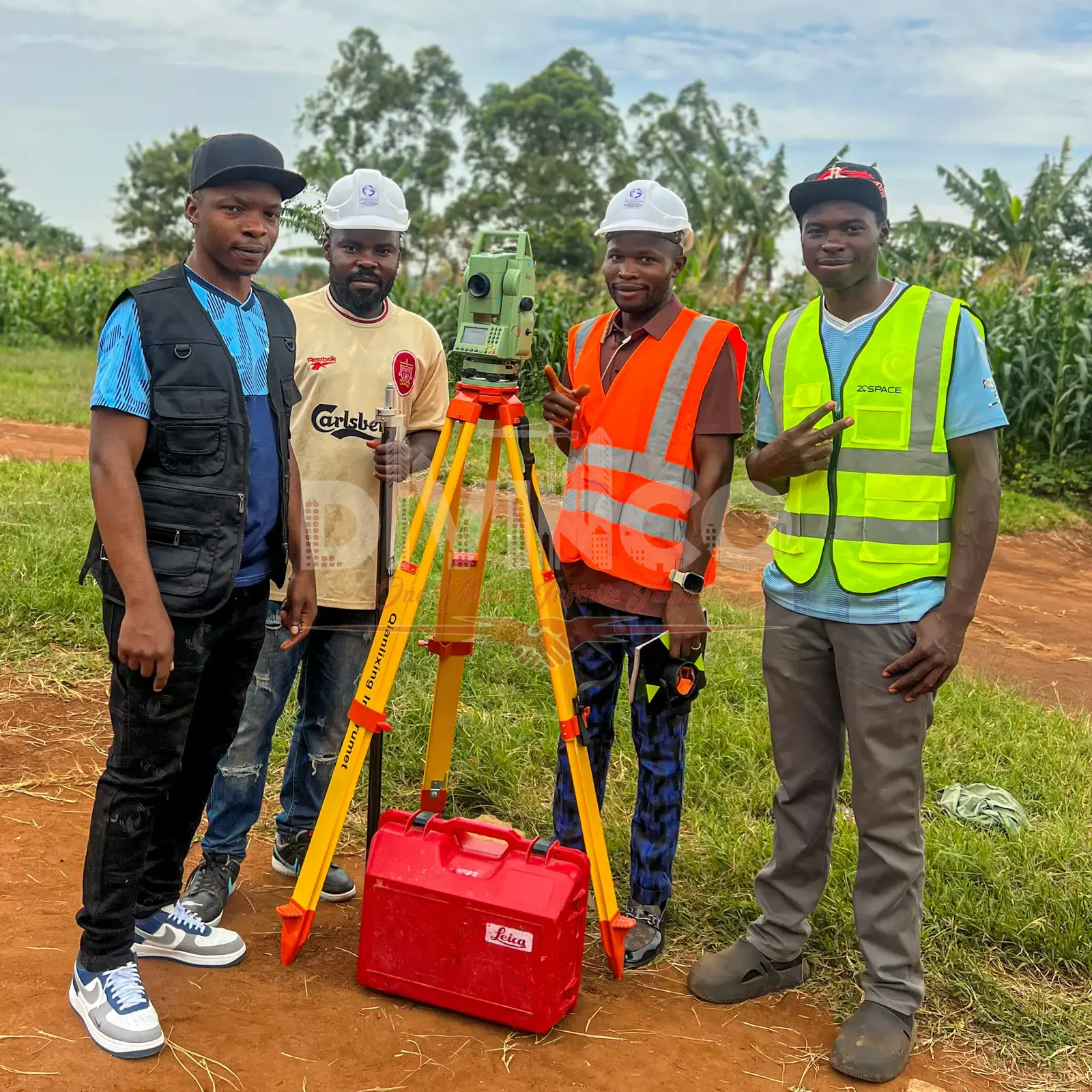 Team DIVINCO — surveyors and engineers on site with a Leica total station